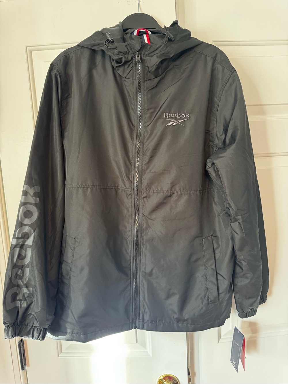 Reebok Black Hooded Windbreaker with Logo Sleeve Print